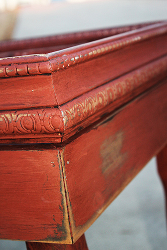 Red distressed table made from an old window