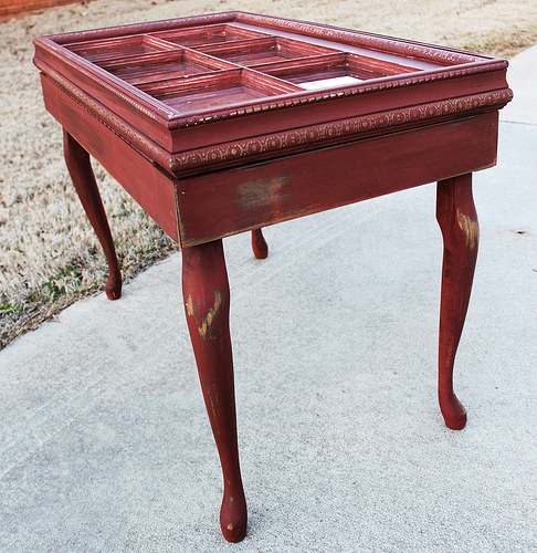 Red distressed table made from an old window