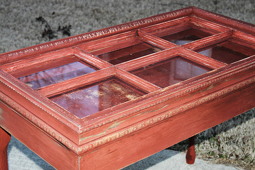 Red distressed table made from an old window