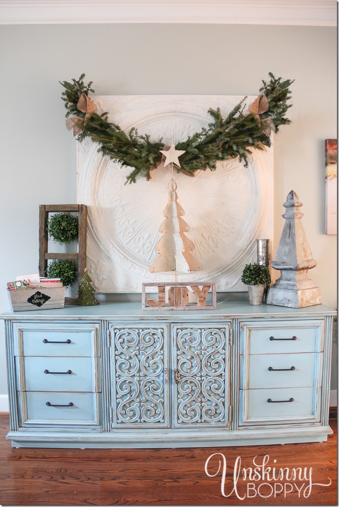 Happy blue distressed dresser in a living room