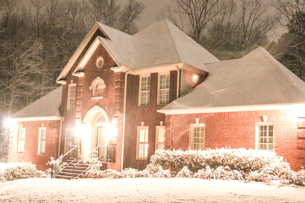 Red brick house in the snow (1 of 1)