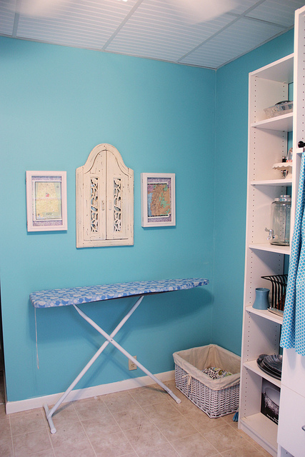 ironing board in blue laundry