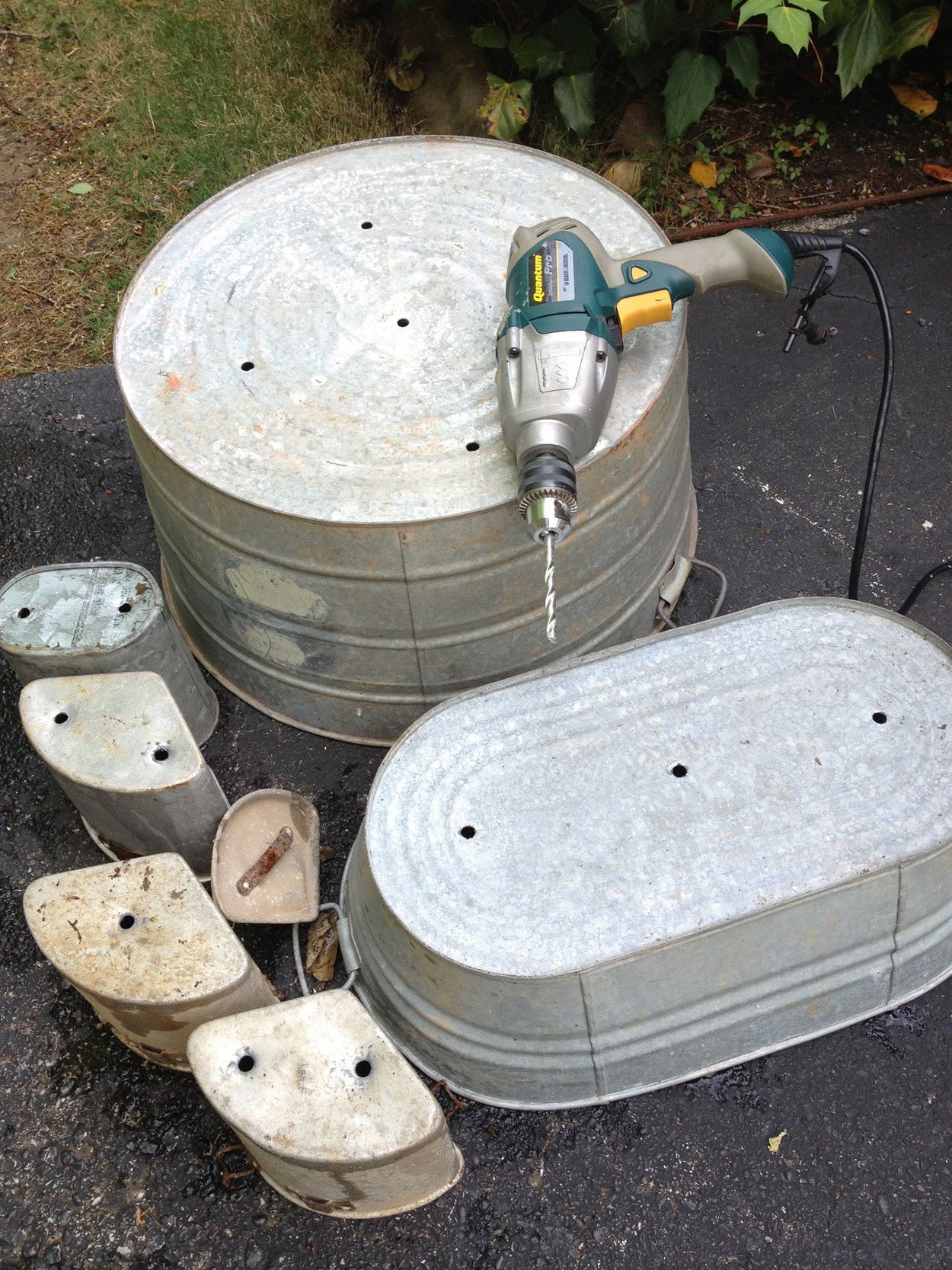 drilling holes in galvanized tubs