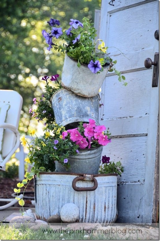 Image of Stacked galvanized bucket planter