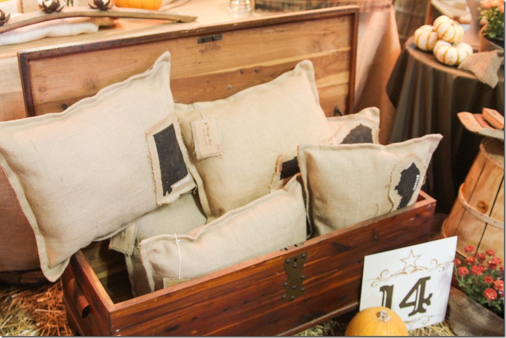 Bella Rustica Nashville 2012 Peachy Magnolia Booth burlap pillows with states