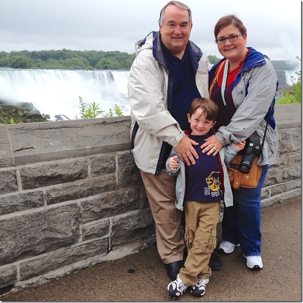 posed in front ofniagara falls