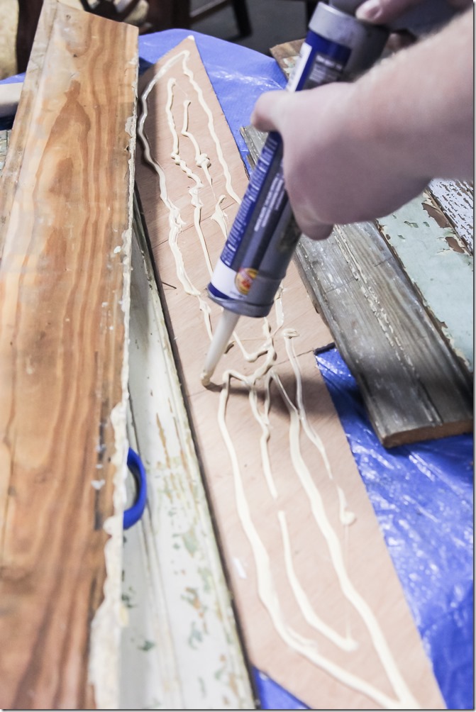 Next step was gluing all of the wood pieces down onto the traced wood star. Use a strong adhesive to make sure the wood sticks. 