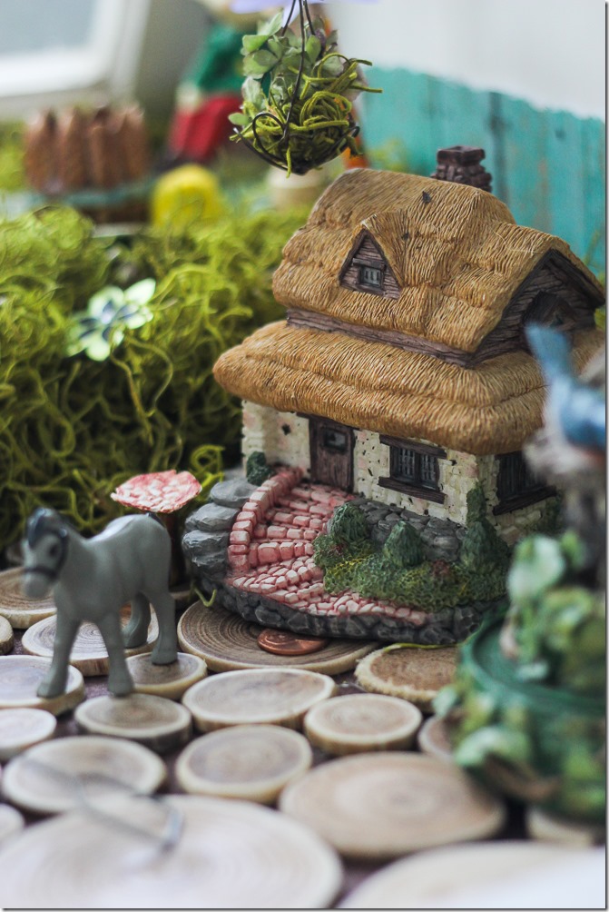 Village details in my DIY Fairy Garden - the horse is almost as big as the house!