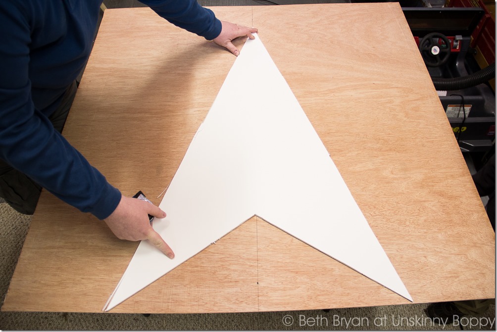 Trace the star template on the sheet wood five times, for all five points of the star. 