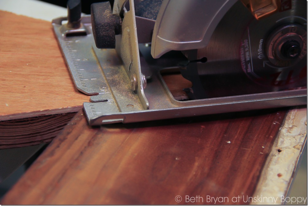 Cut the excess wood edges off of the wooden backboard, make sure to carefully not cut the backing of the star. 