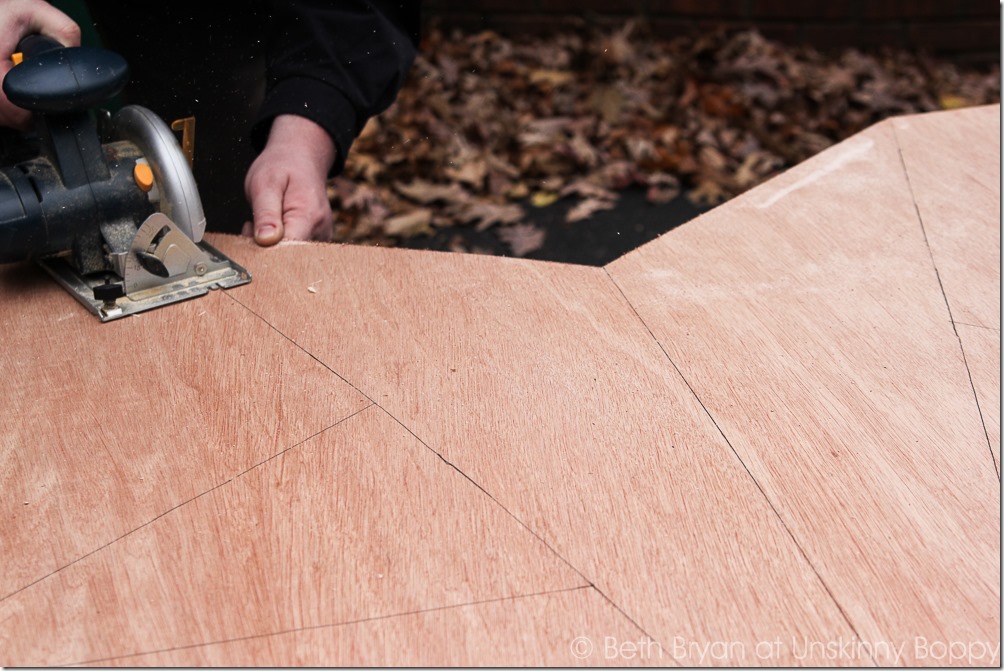 Carefully use an electric saw to cut out the traced star lines. Keep the kids away from this part!