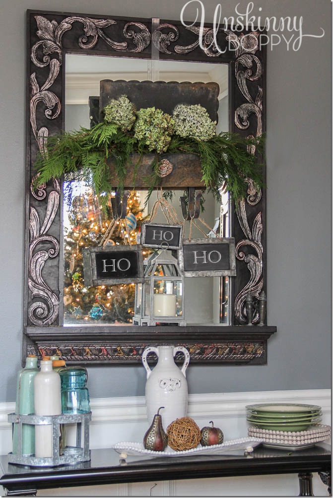 Vintage mailbox filled with evergreens and Ho Ho Ho on chalkboards