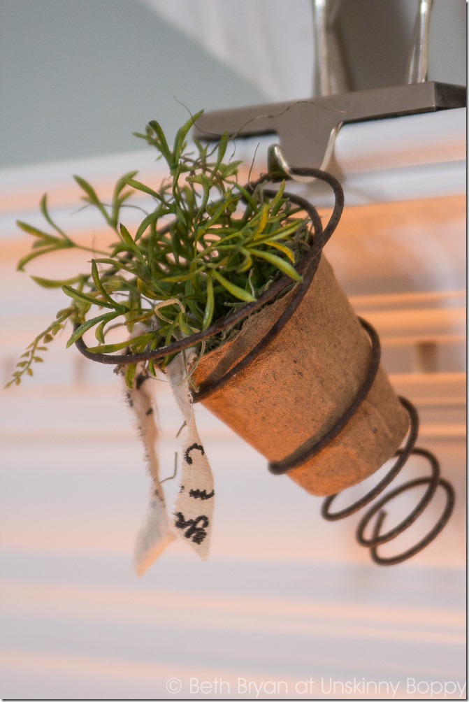 Cute Bedspring planter on a Christmas mantel