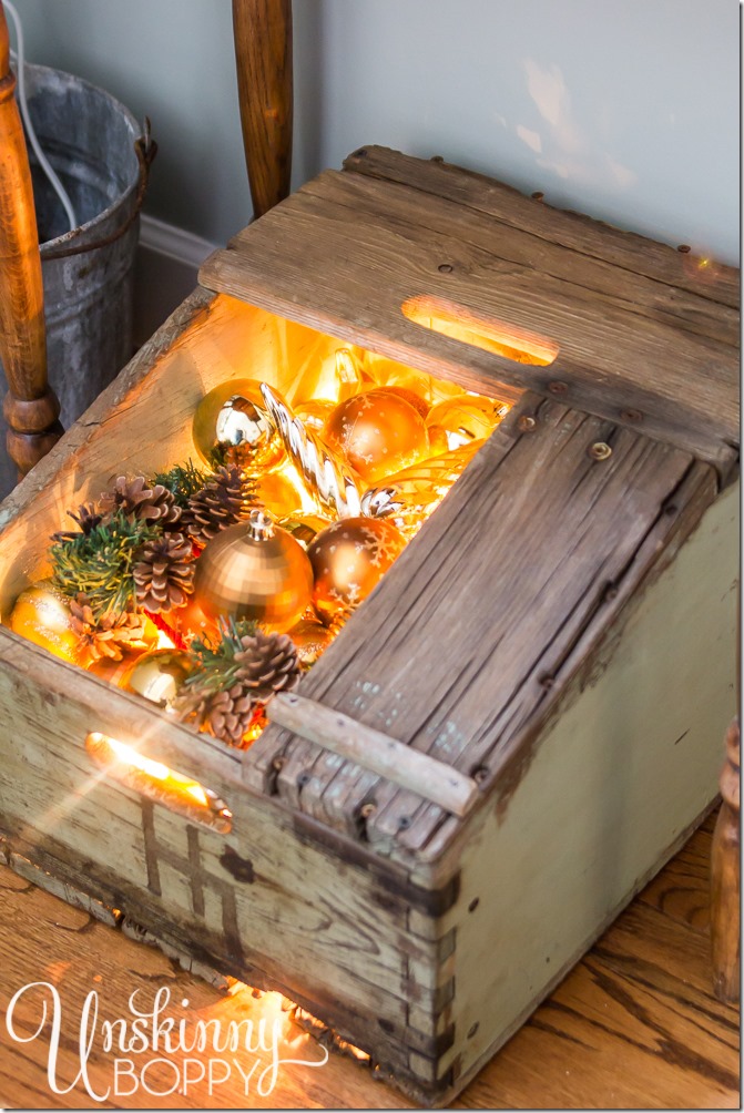 Fill an old box with Christmas lights and ornaments for an instant display. It looks like a box of magic!