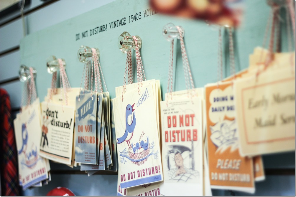 The local boutiques in Tybee Island, Georgia have the cutest little treasures, like these vintage do not disturb door signs.