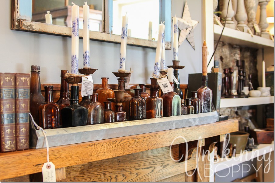 Scarlet Scales Antiques in Nashville is a designer's dream place. so many amazing antiques and cute little things to take home with you; like these glass jar candle holders. 