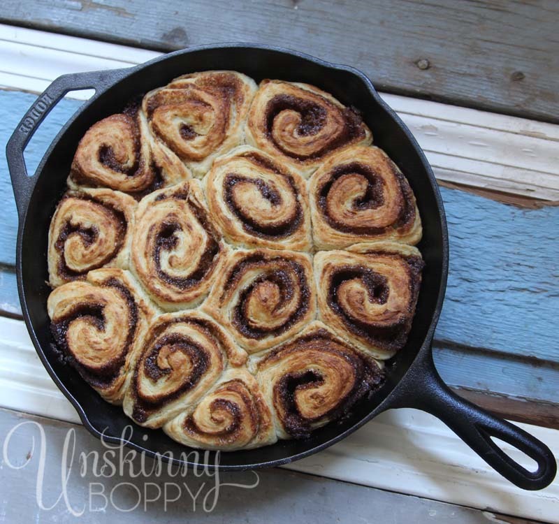 homemade cinnamon rolls in cast iron skillet