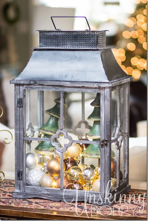 Pretty lantern filled with ornaments and lights