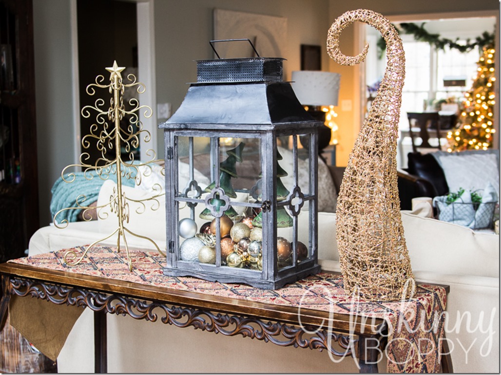 Pretty lantern filled with ornaments and lights