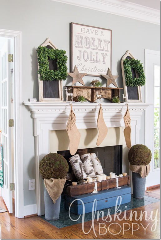 Christmas mantel with boxwood wreaths