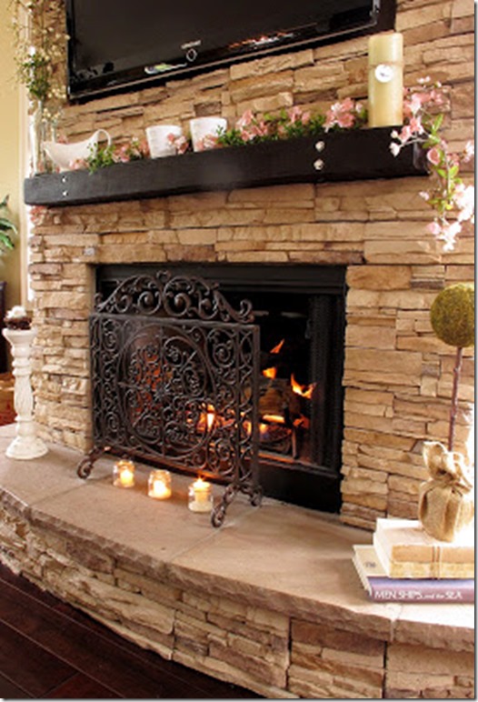 Rock Fireplace with curved hearth