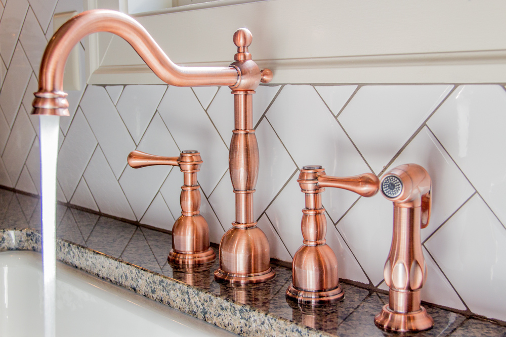 copper faucet by signature homes