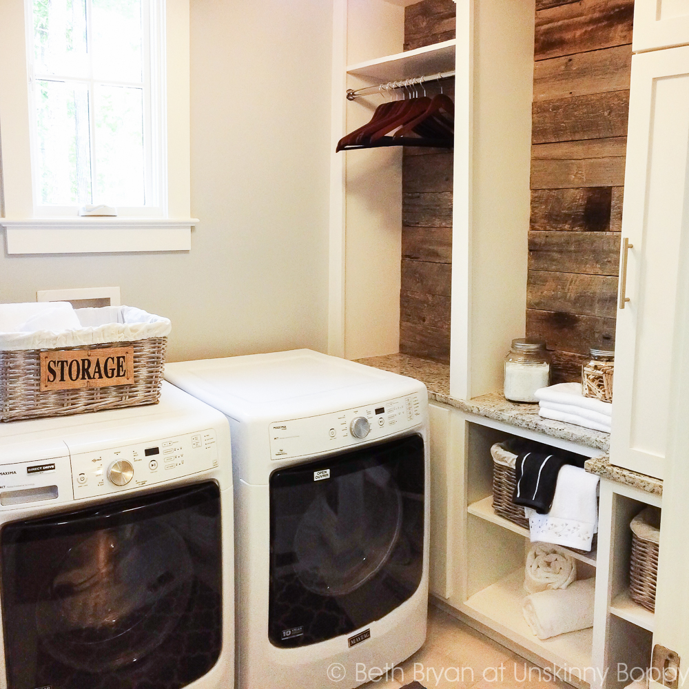 Reclaimed wood in the laundry room = Birmingham Parade of Homes Decor Ideas