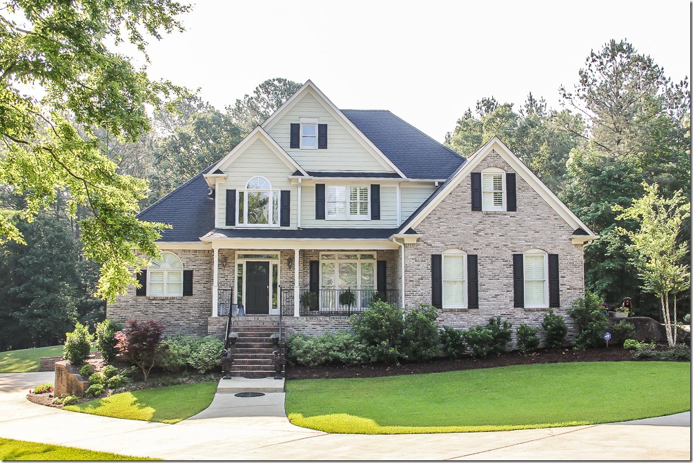 Pretty house with grey brick/ black shutters