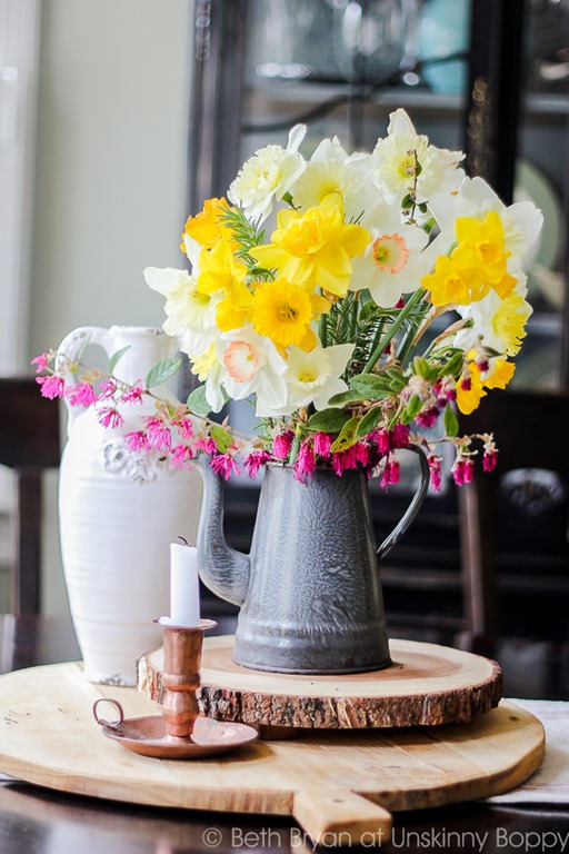 Cut Flower arrangement: Daffodils, Rosemary and Loropetalum in a teapot