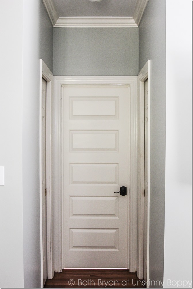 After we installed a new door in the cased opening of our master bathroom. This was an easy DIY project that added privacy and style to our master suite. 