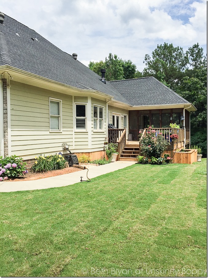 Backyard landscaping with raised garden beds-14