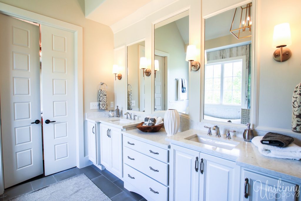 Master bathroom cabinetry with separate mirrors