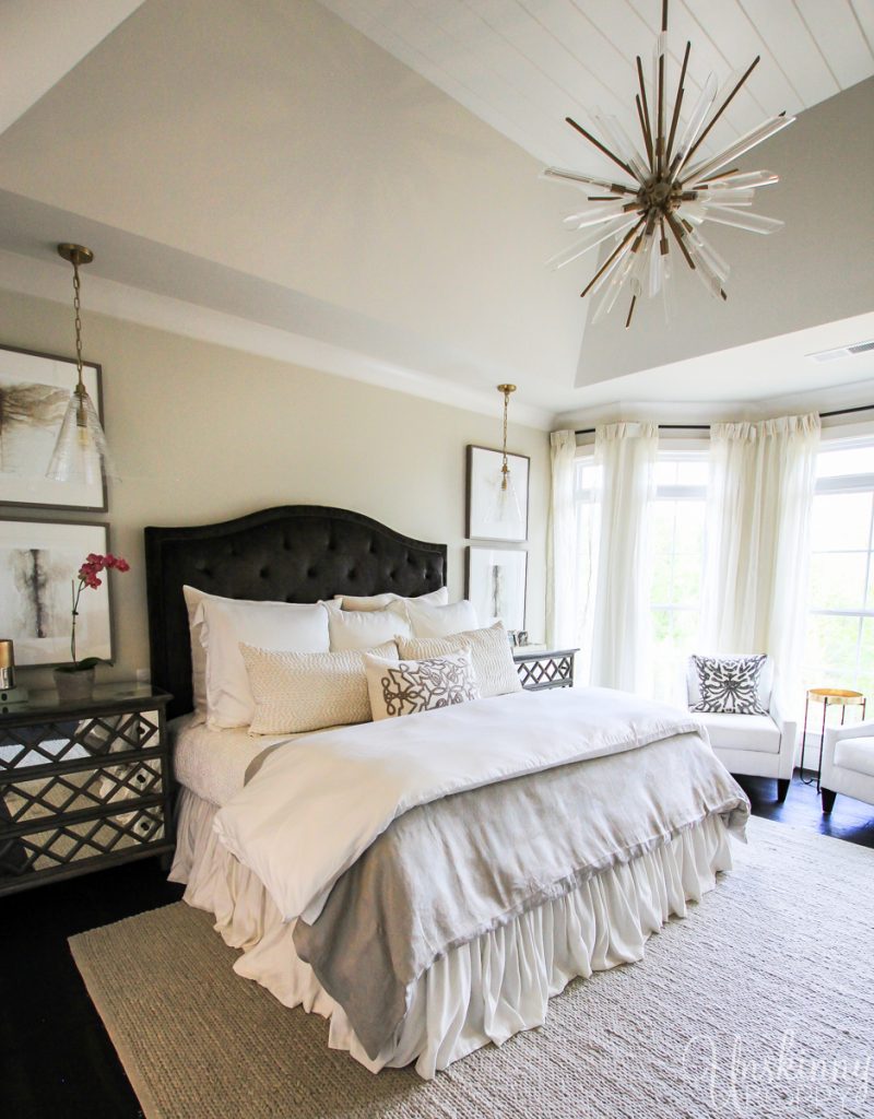 Beautiful master bedroom with ruffled bed skirt