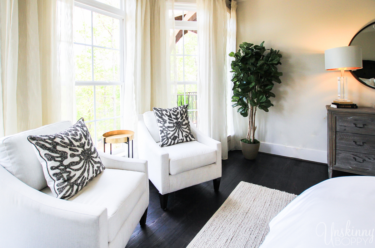 Chairs in bay window in bedroom