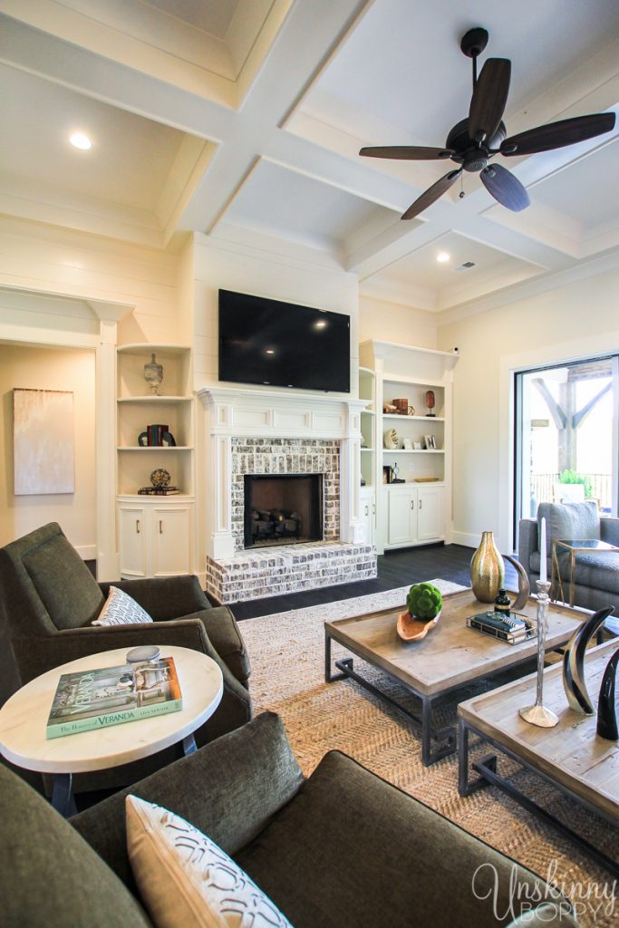 Amazing fireplace with built-ins and coffered ceilings