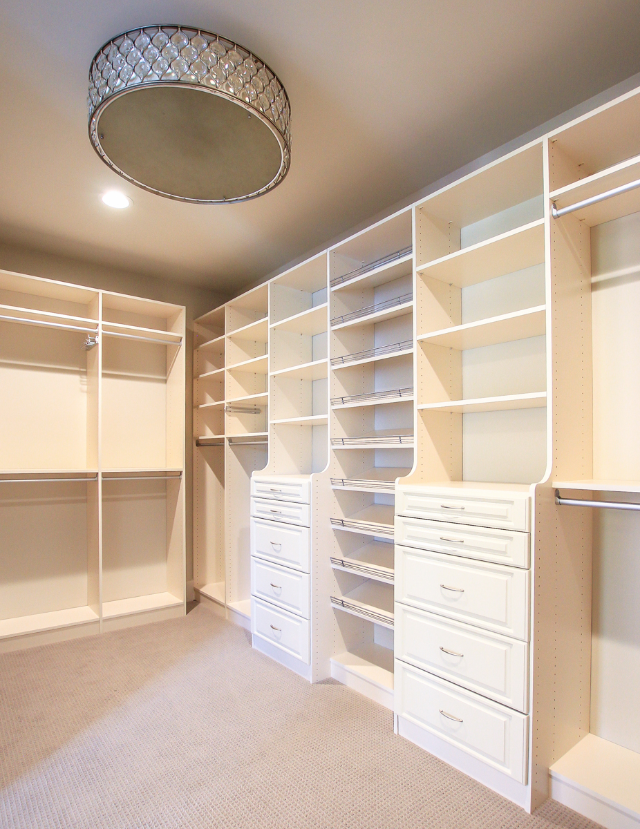 Giant master closet with drum lighting