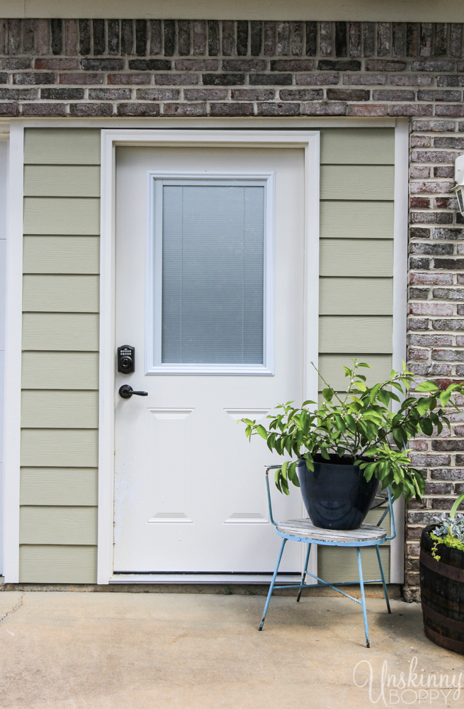 Replacing double garage door with single and exterior door-5