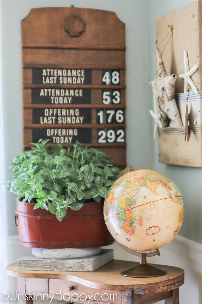 church attendance sign with globe