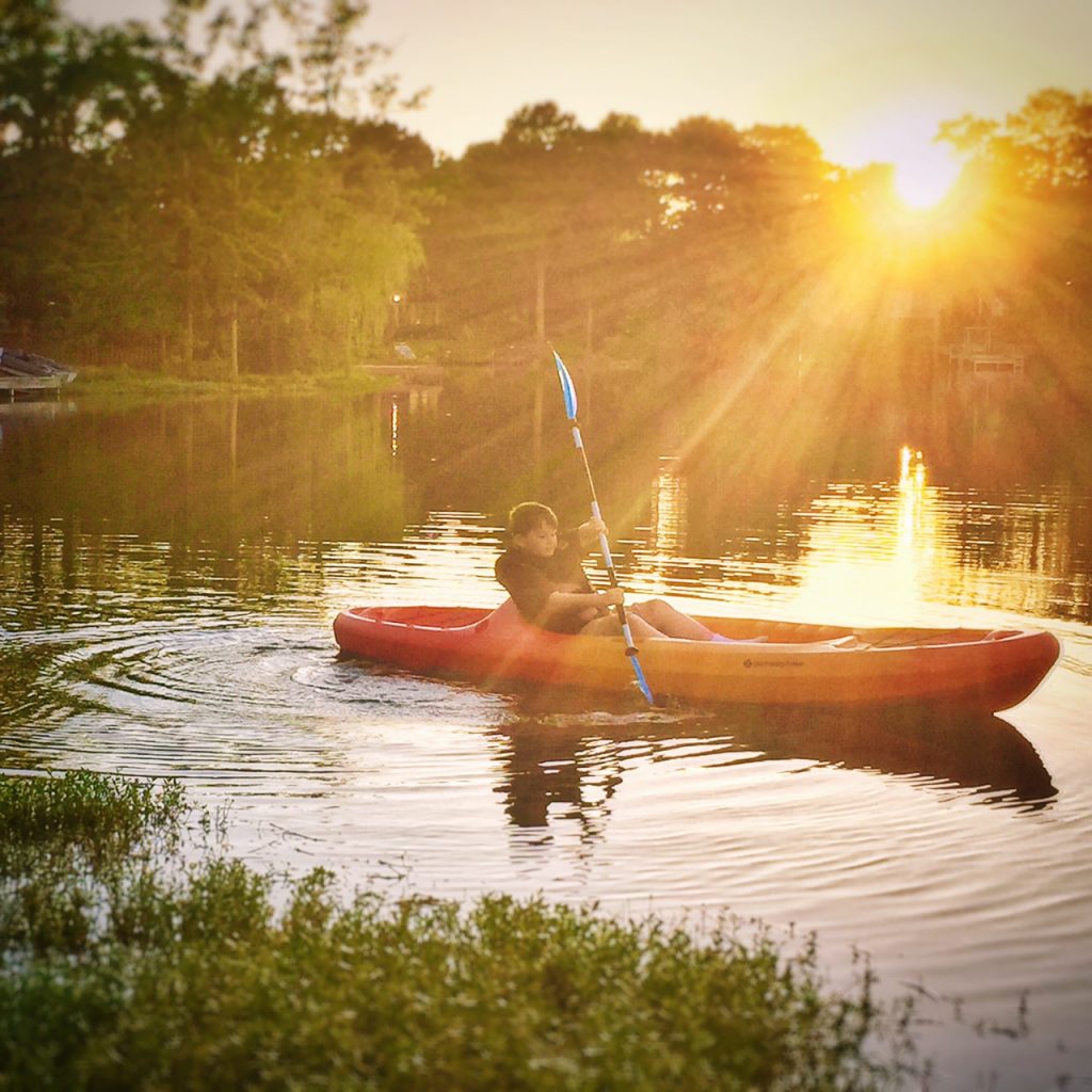 kayaking at sunset