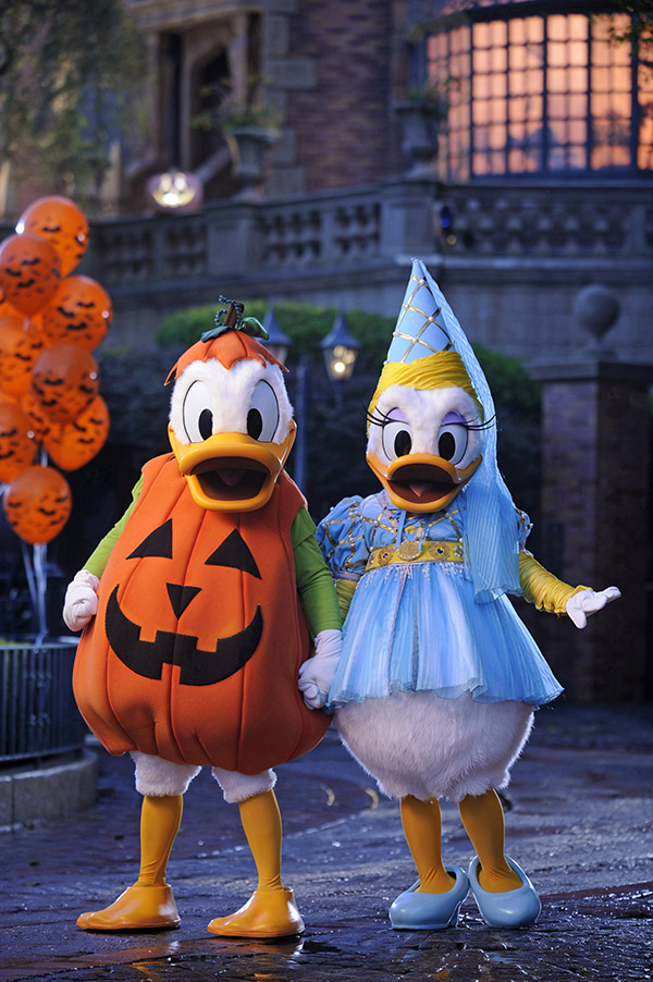 Donald Duck and Daisy dressed up for Mickey's not-so-spooky Halloween party at Disney World