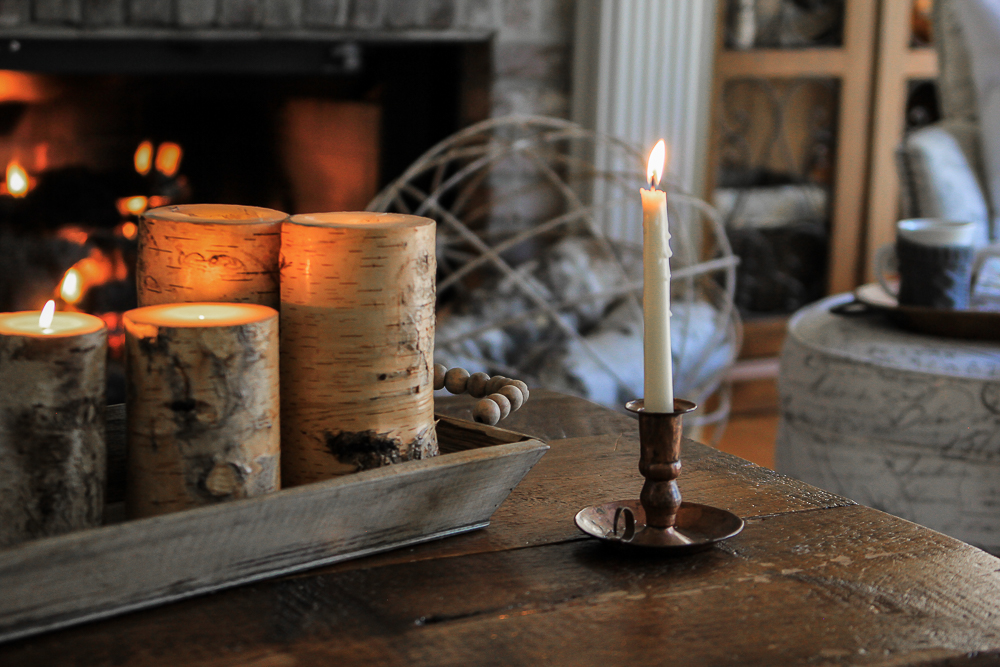 Hygge- candlelight warmth in front of fireplace