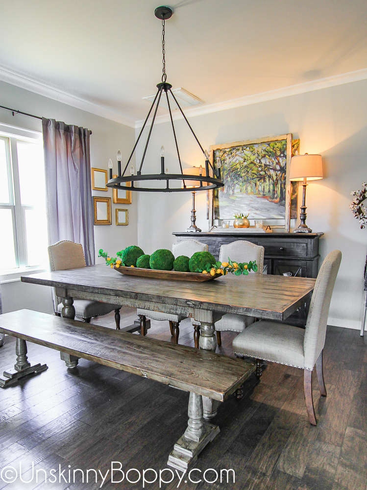 Farmhouse dining table with bench and circular light fixture