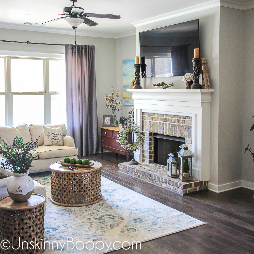 pretty brick fireplace with grey paint color