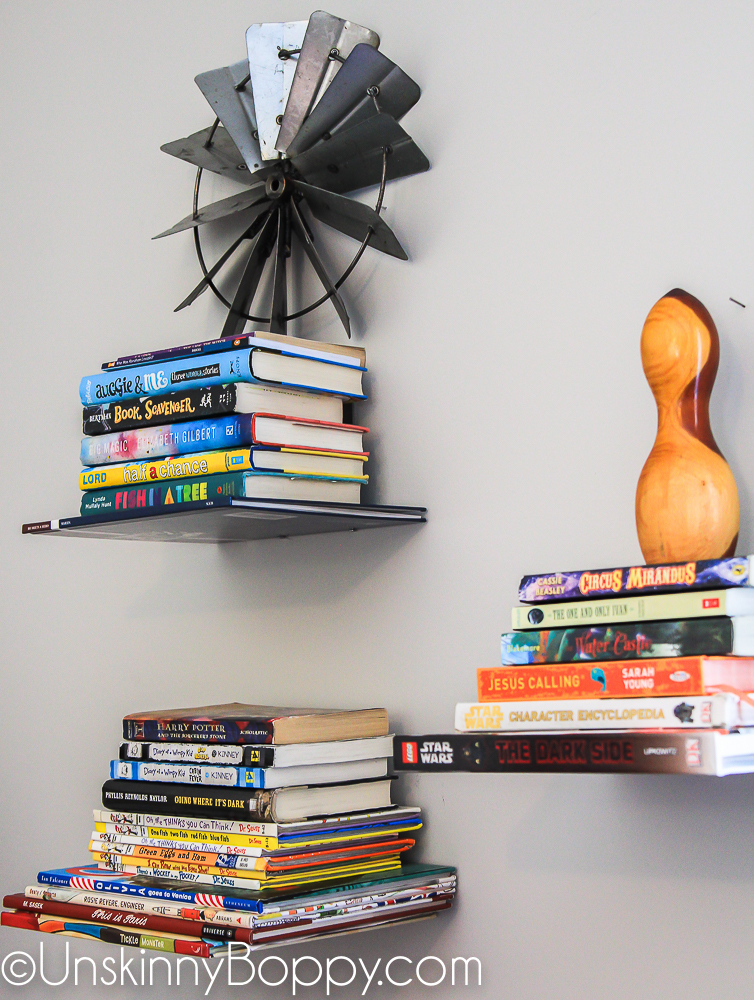 Umbra floating book brackets on wall