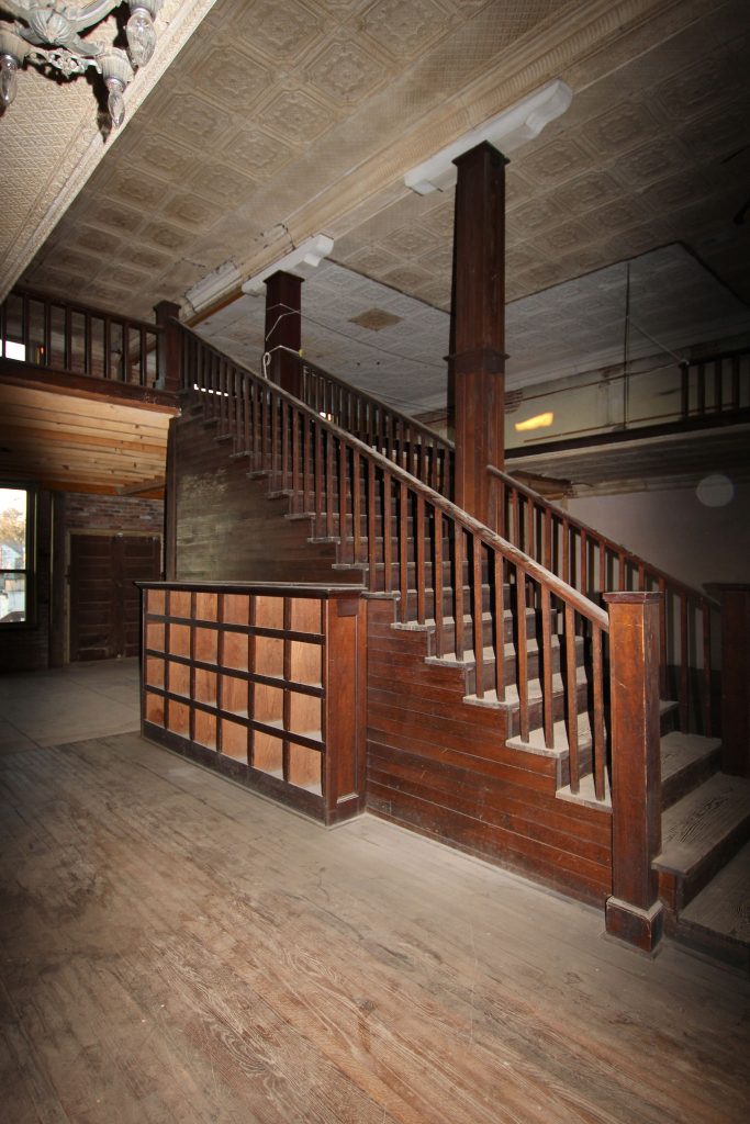 Staircase in a Turn-of-the-Century Mercantile Store in need of renovation