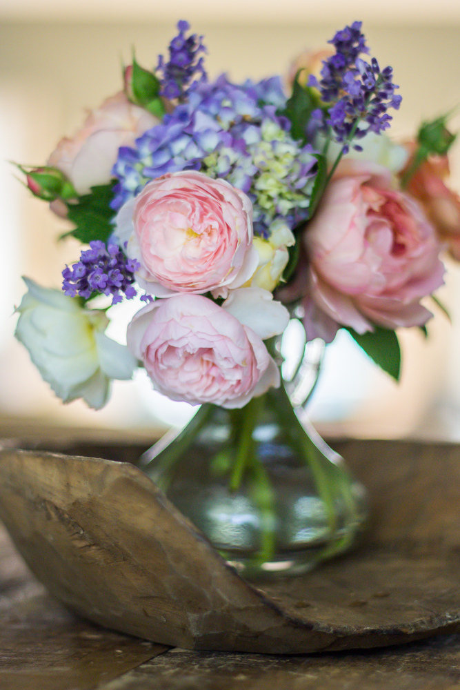 Cut flower arrangement of roses, hydrangea and lavender