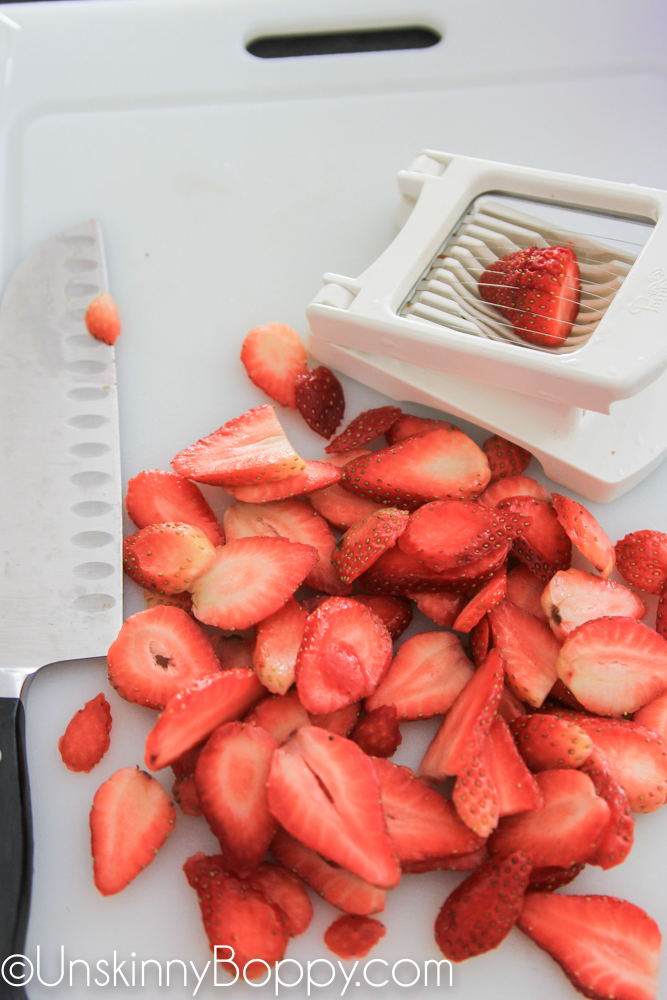 slicing strawberries with Pampered Chef egg slicer