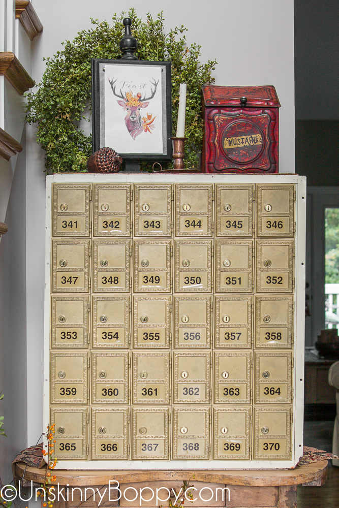 vintage mailboxes on a side table
