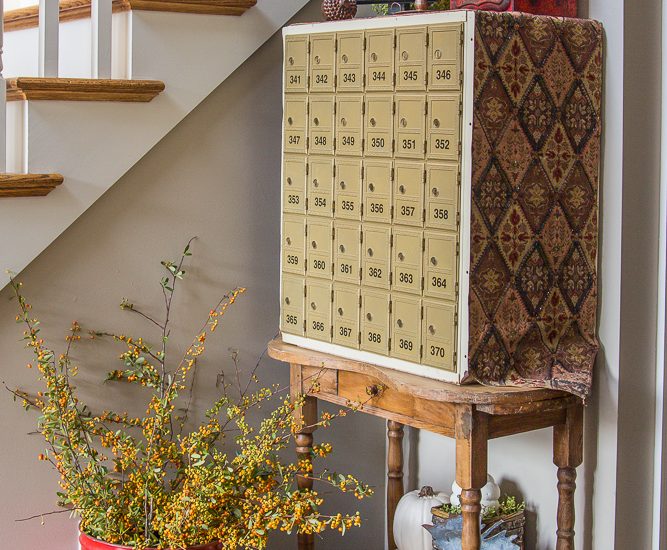 Fall decor on vintage post office box table