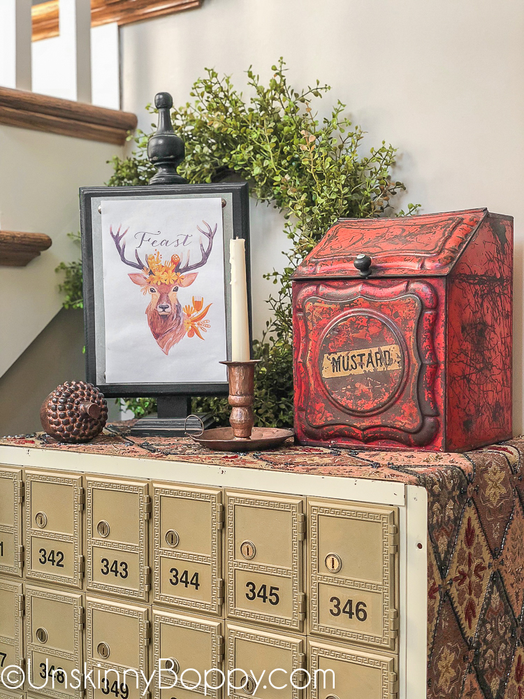 Fall decor - red mustard box, copper candlestick and old post office boxes